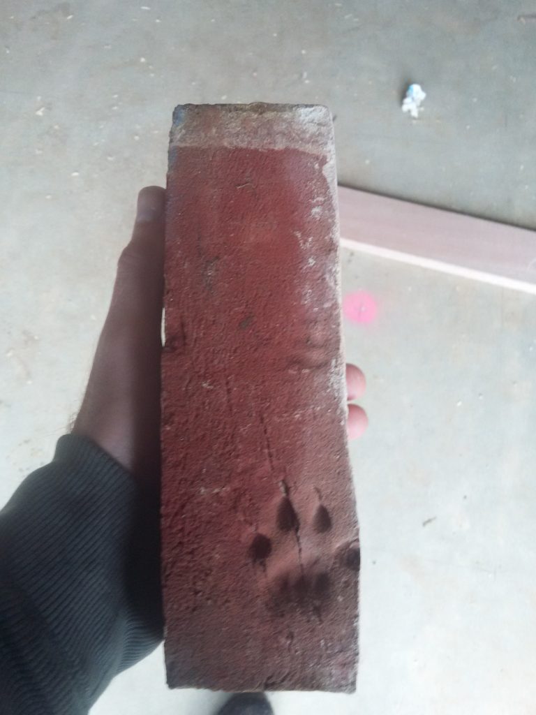 Footprint in recycled brick