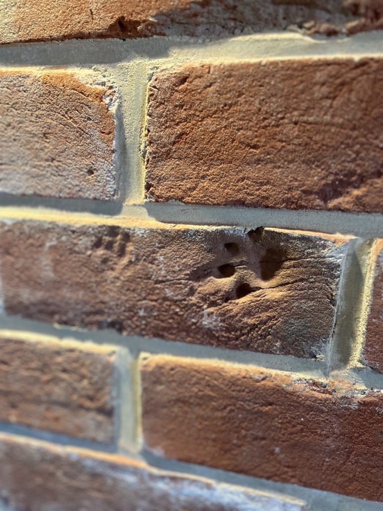 Footprints in recycled brick